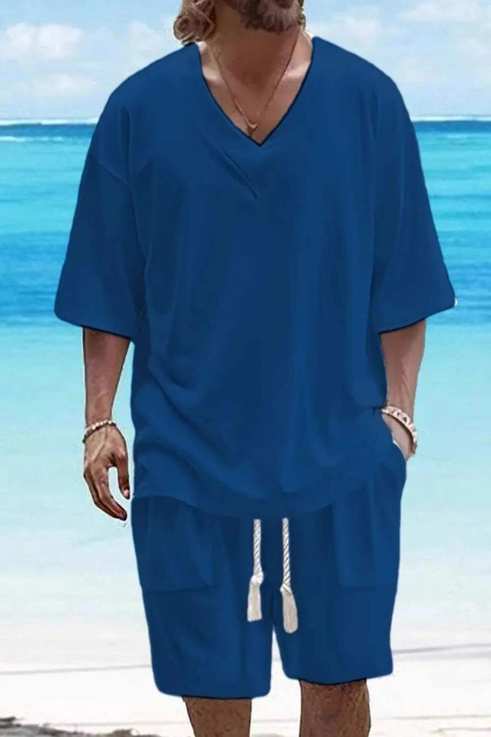 V-Neck Half Sleeve Top and Shorts Set for men by the beach, breathable activewear in blue.