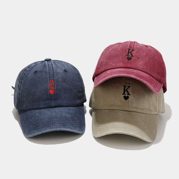 Three vintage baseball caps in navy blue, wine red, and beige, featuring a classic design with embroidery, adjustable strap, and dome crown style.