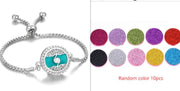 Hollow Stainless Steel Aromatherapy Bracelet with interlocking design and vibrant essential oil pads.