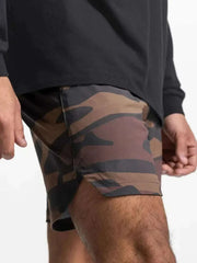 Camo pattern elastic waist active shorts for men, ideal for athletic activities.