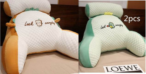 Fluffy sofa cushion pillow in orange and green designs with cute embroidery, providing comfort and style in a living space.