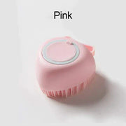 Pink soft silicone dog brush with built-in shampoo dispenser for gentle grooming.