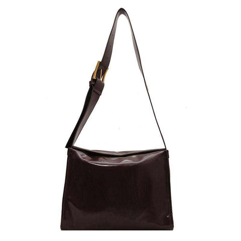 Retro Crossbody Commuter Tote with adjustable strap in brown PU material, showcasing retro style and urban simplicity.