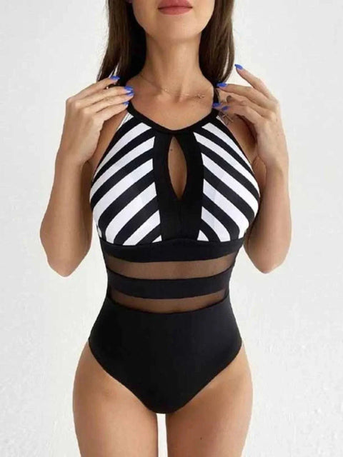 Black and white striped mesh backless swimsuit with keyhole front and sheer midsection panels.