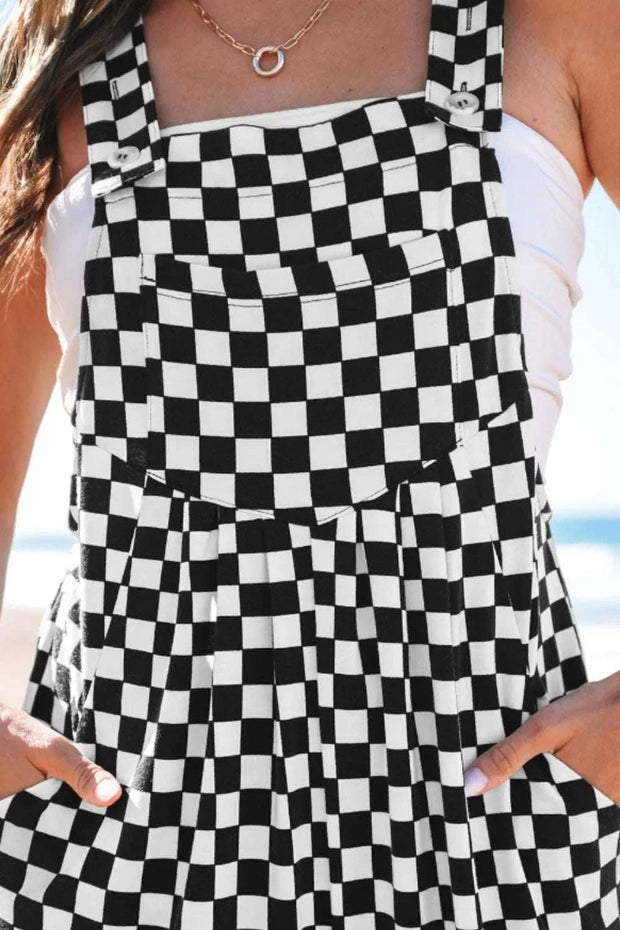Checkered print wide leg jumpsuit with pockets and V-neckline.