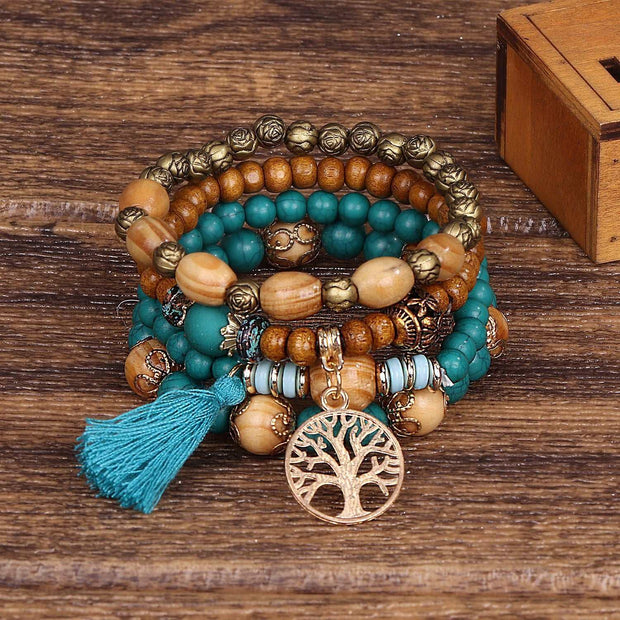 Boho Wooden Stretch Bracelet with polished wooden beads and bohemian style charms.