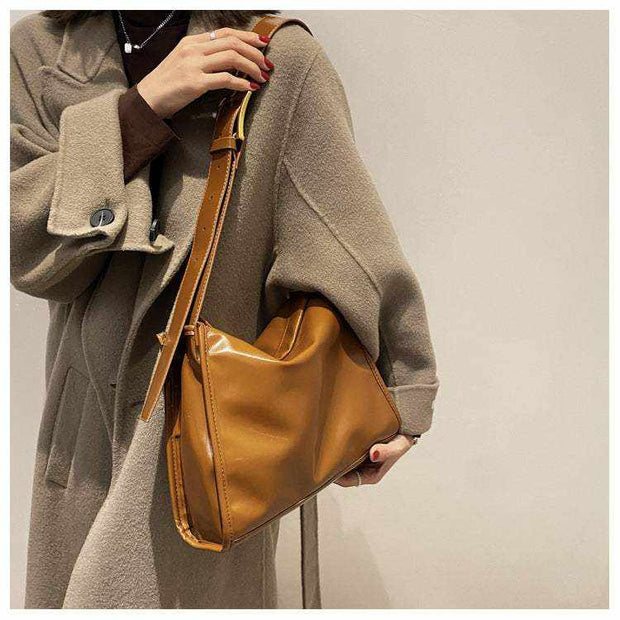 Retro Crossbody Commuter Tote in PU leather with adjustable strap, stylish and durable for daily use.