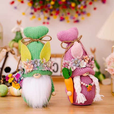 Easter Knit Faceless Doll with bunny ears and flower accents for festive decoration.