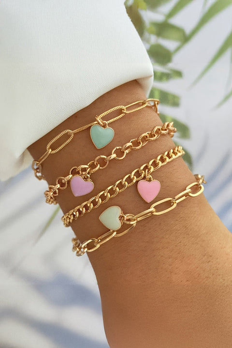 Gold Heart Adjustable Bracelet with colorful heart charms on wrist.