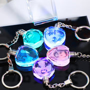 Crystal keychain with custom photo displaying vibrant colors and personalized images.