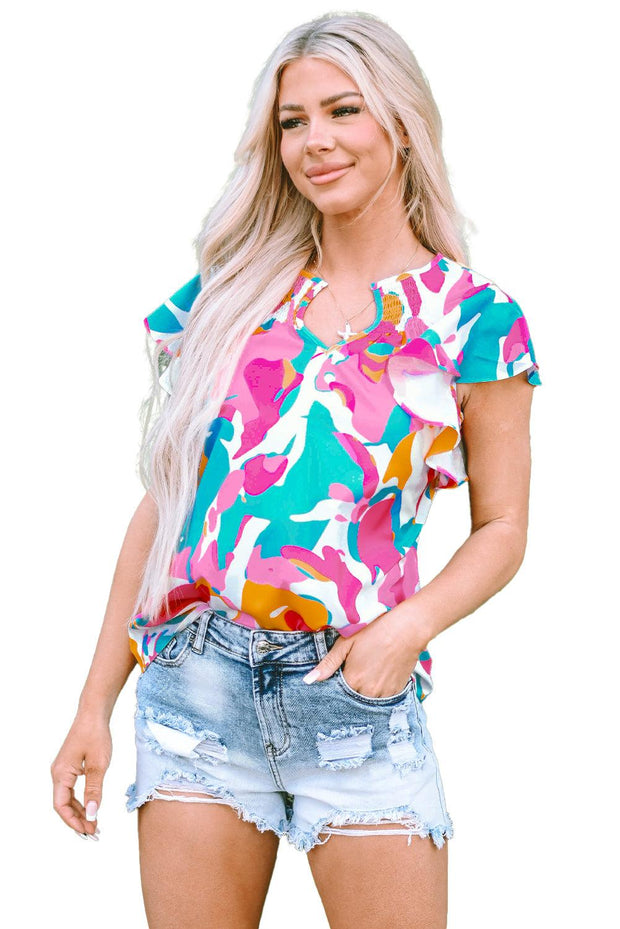 Multicolored abstract ruffle blouse with notched neckline and short flutter sleeves.