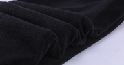 Close-up of soft, textured black fabric used in Boys Blue Jeans.