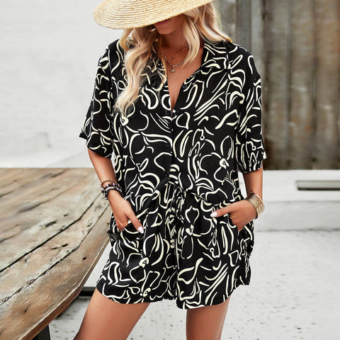 Vibrant printed shirt and drawstring shorts set in black and white, ideal for casual outings.