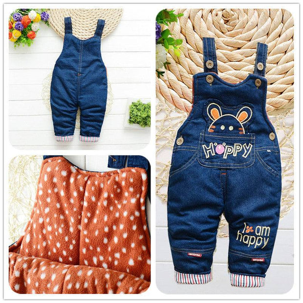 Children overalls with cartoon pattern, adjustable straps, and soft lining.
