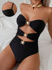 Elegant black Sweetheart Neck Cutout Swimsuit with gold accents, showcasing cutout design for beachwear fashion.