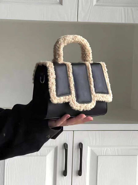 Lambs Wool Crossbody Bag in black with cozy handle and trim.