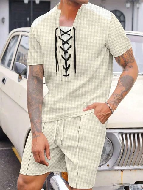 Waffle Knit Top and Shorts Set with lace-up neckline and drawstring shorts, worn by a person standing beside a vintage car.