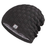Black Tiger Label Fleece Hat with unique branding detail, providing warmth and comfort for outdoor adventures.
