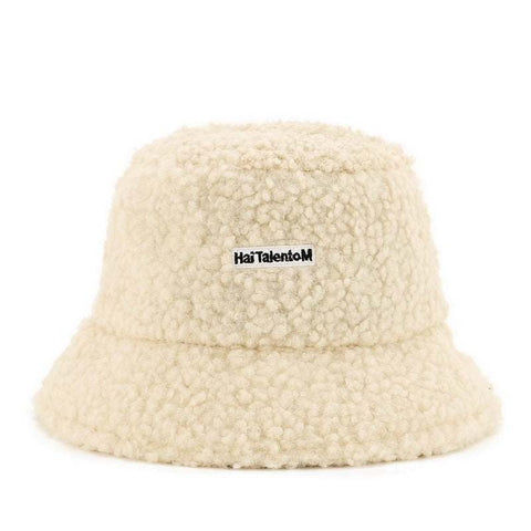 Lambswool Female Fishing Cap with dome design and short brim for warmth and style.