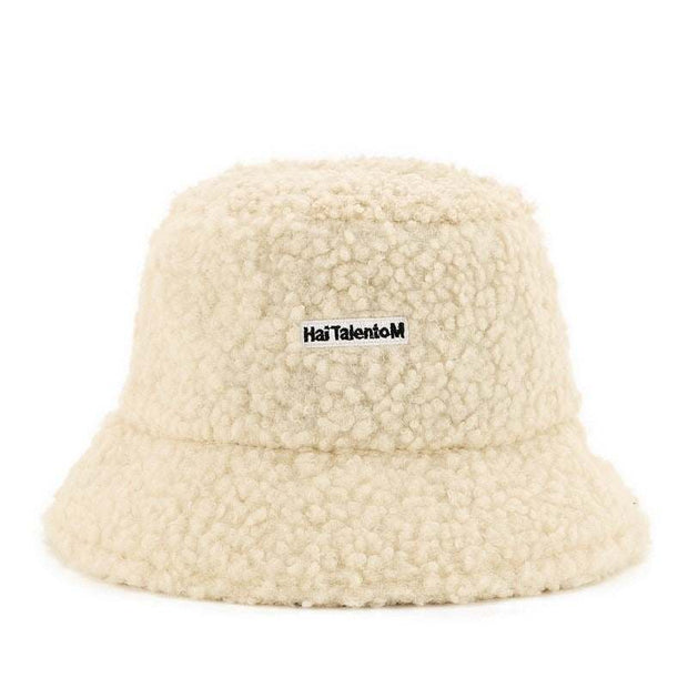 Lambswool Female Fishing Cap with dome design and short brim for warmth and style.