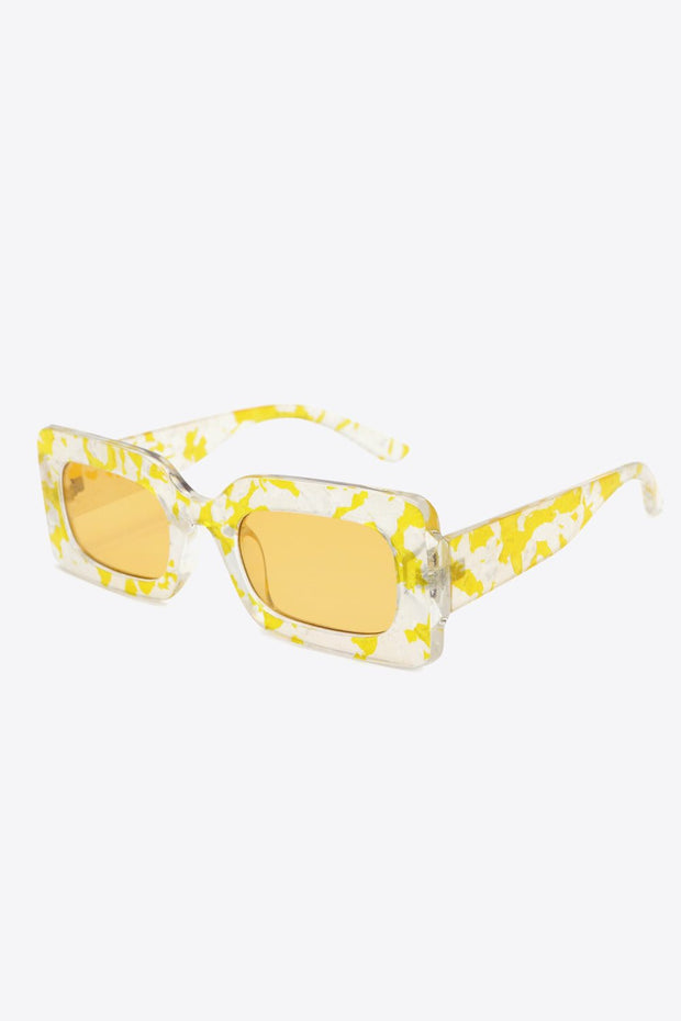 Tortoiseshell rectangle polycarbonate sunglasses with UV400 protection and case.