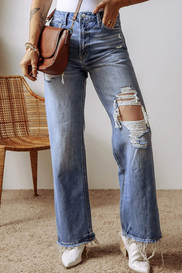 Distressed straight leg jeans with trendy rips, high-rise waist, and classic five-pocket design in sky blue denim.