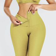 Abdominal Hip Lift Yoga Pants in light yellow with high-waisted compression design for support and shaping.