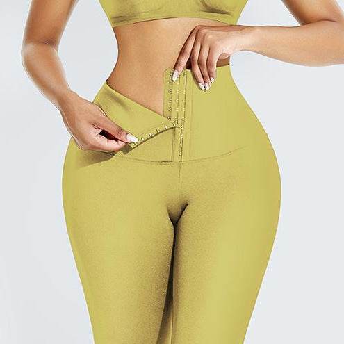 Abdominal Hip Lift Yoga Pants in light yellow with high-waisted compression design for support and shaping.