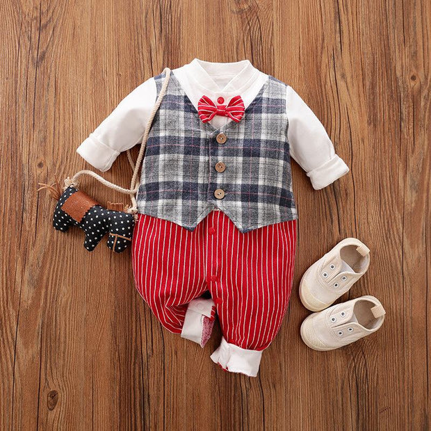 Baby Gentleman Jumpsuit with plaid vest, striped pants, and bowtie on wooden background.
