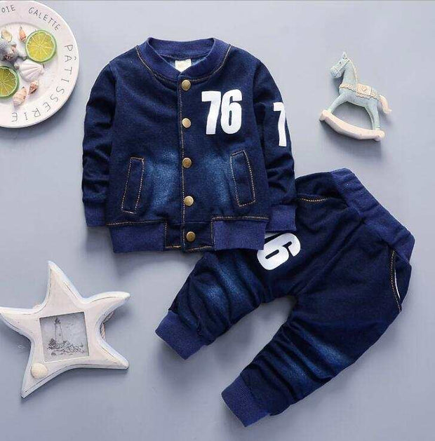 Boys denim suit with a dark blue denim jacket and matching pants, featuring numbers on the chest and thigh.