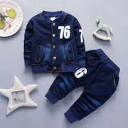 Boys Denim Suit in dark blue with jacket and matching pants featuring number detailing for style and comfort.