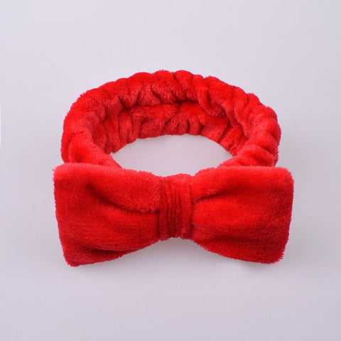 Coral Velvet Butterfly Hair Band with butterfly design and soft velvet texture.