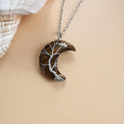Moon Tree of Life Necklace with crescent moon and tree design, crafted from natural stone on a water wave chain.