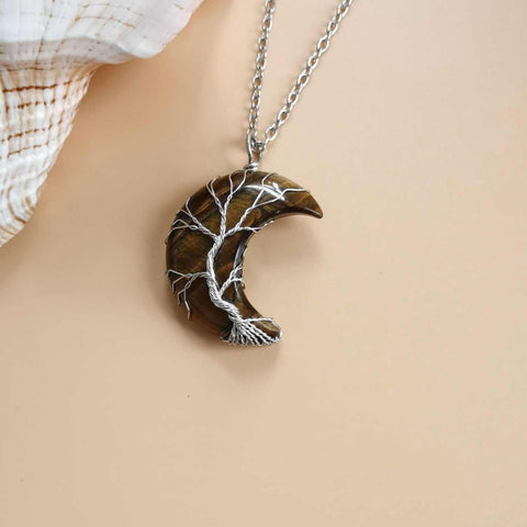 Moon Tree of Life Necklace with crescent moon and tree design, crafted from natural stone on a water wave chain.