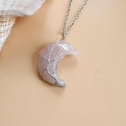 Moon Tree Of Life Necklace with crescent moon pendant and tree accents.