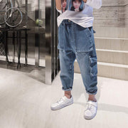 Big Kids Loose Harem Overalls featuring adjustable straps and roomy pockets, ideal for active children.