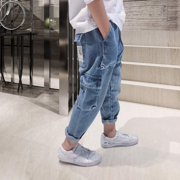 Big Kids Loose Harem Overalls with adjustable straps and roomy pockets.