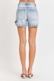 Back view of RISEN Denim Shorts showcasing mid-rise and stylish cut.