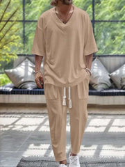Men's V-Neck Half Sleeve Top and Pants Set in neutral tone, showcasing a relaxed fit and sleek silhouette, suitable for casual or semi-formal occasions.