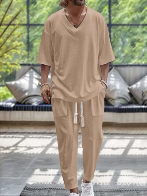 Men's V-Neck Half Sleeve Top and Pants Set in neutral tone, showcasing a relaxed fit and sleek silhouette, suitable for casual or semi-formal occasions.