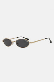 Nicole Lee Finley Oval Metal Frame Sunglasses with UV protection and sleek design.