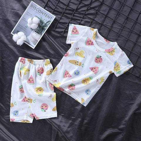 Youth pajama set with fun fruit print, short sleeves, and elastic waistband.