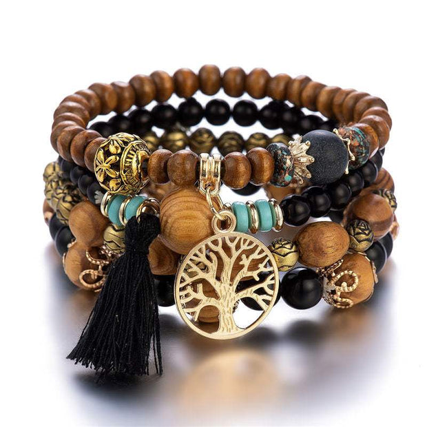 Boho Wooden Stretch Bracelet with polished wooden beads and bohemian charm.