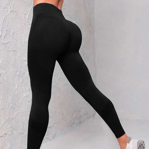 Seamless high waist yoga pants providing comfort and flexibility.