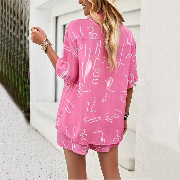 Vibrant printed shirt paired with matching drawstring shorts for a chic casual look.