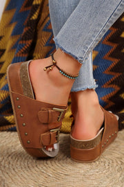 Chestnut Studded Platform Slides with dual buckle design and bold studs.