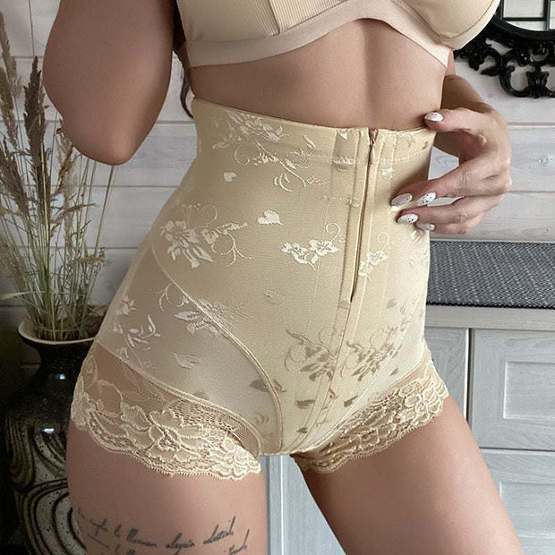 Lace high waist belly zipper pants in skin tone with elegant detailing.
