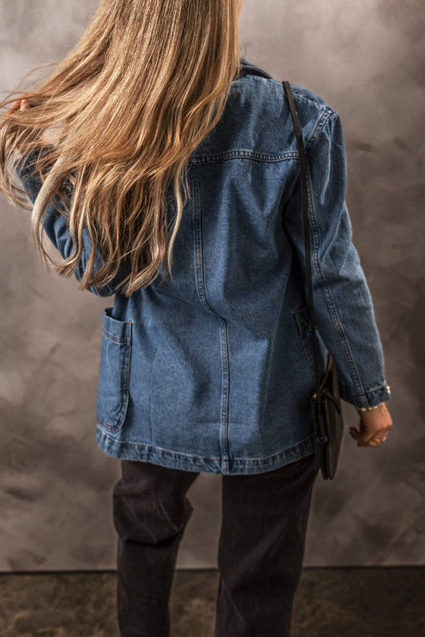 Pocketed Denim Jacket with long sleeves and functional pockets, shown from the back.