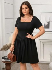 Plus size square-neck short-sleeve mini dress in black, flattering fit, perfect for casual or evening wear.