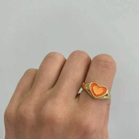 Creative Love Heart Ring with heart-shaped design on hand.